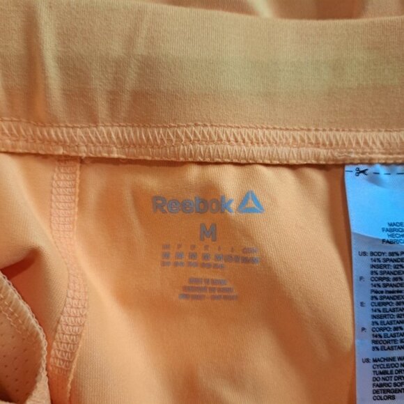 Reebok womens size Medium cropped Play Ice yellow leggings - Picture 8 of 8